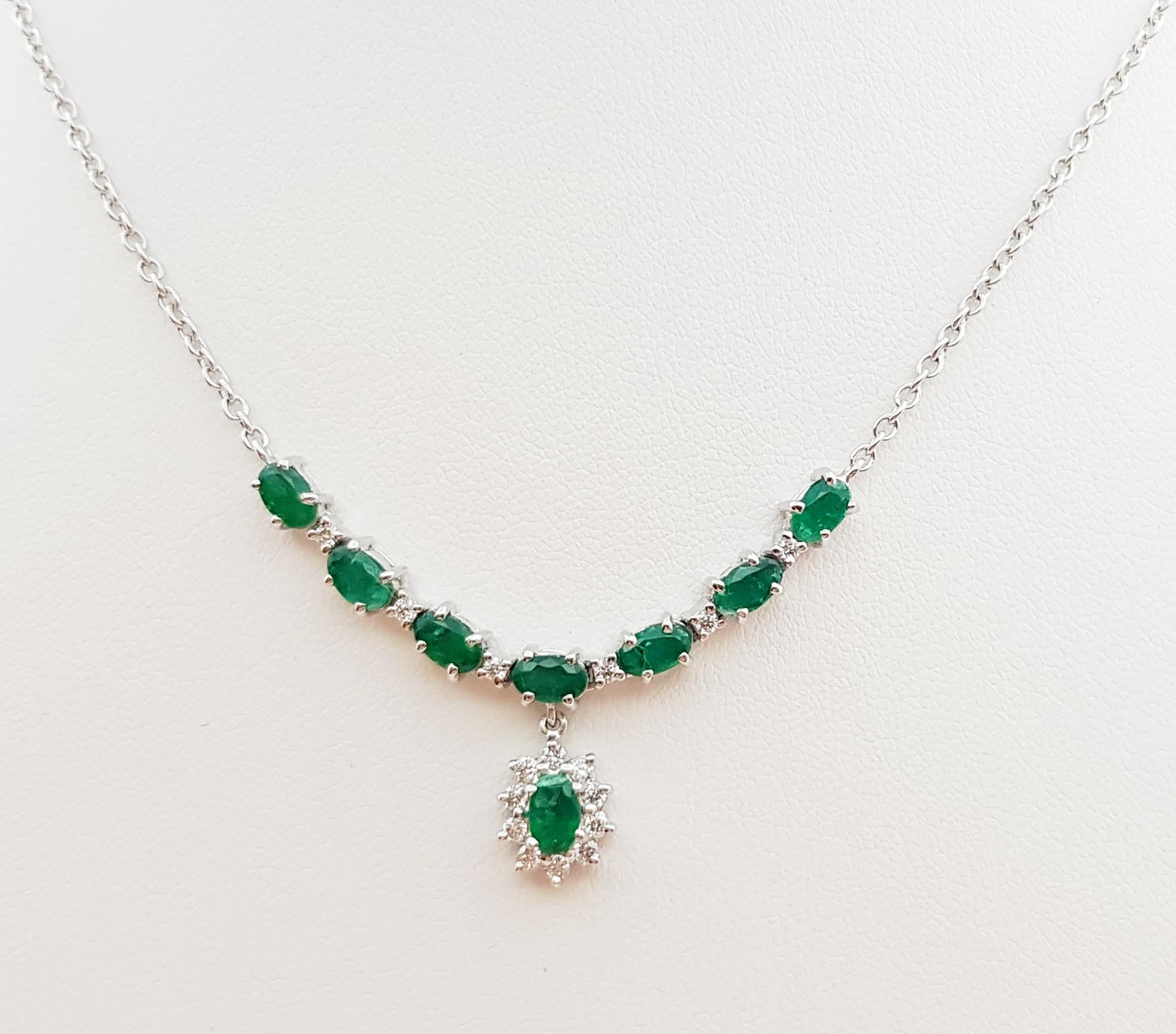 emerald diamond pendant set