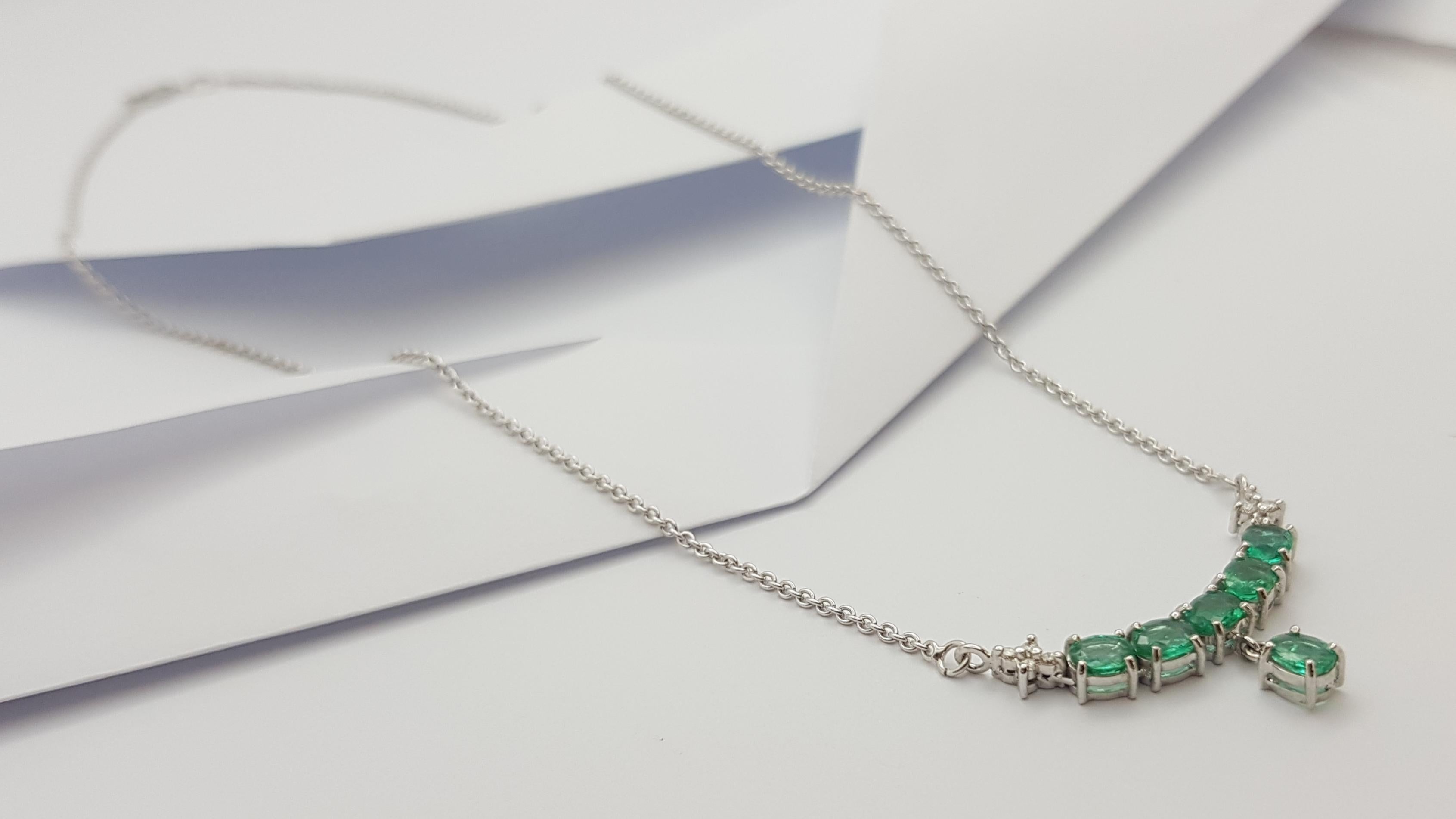 Oval Cut Emerald with Diamond Necklace Set in 18 Karat White Gold Settings For Sale