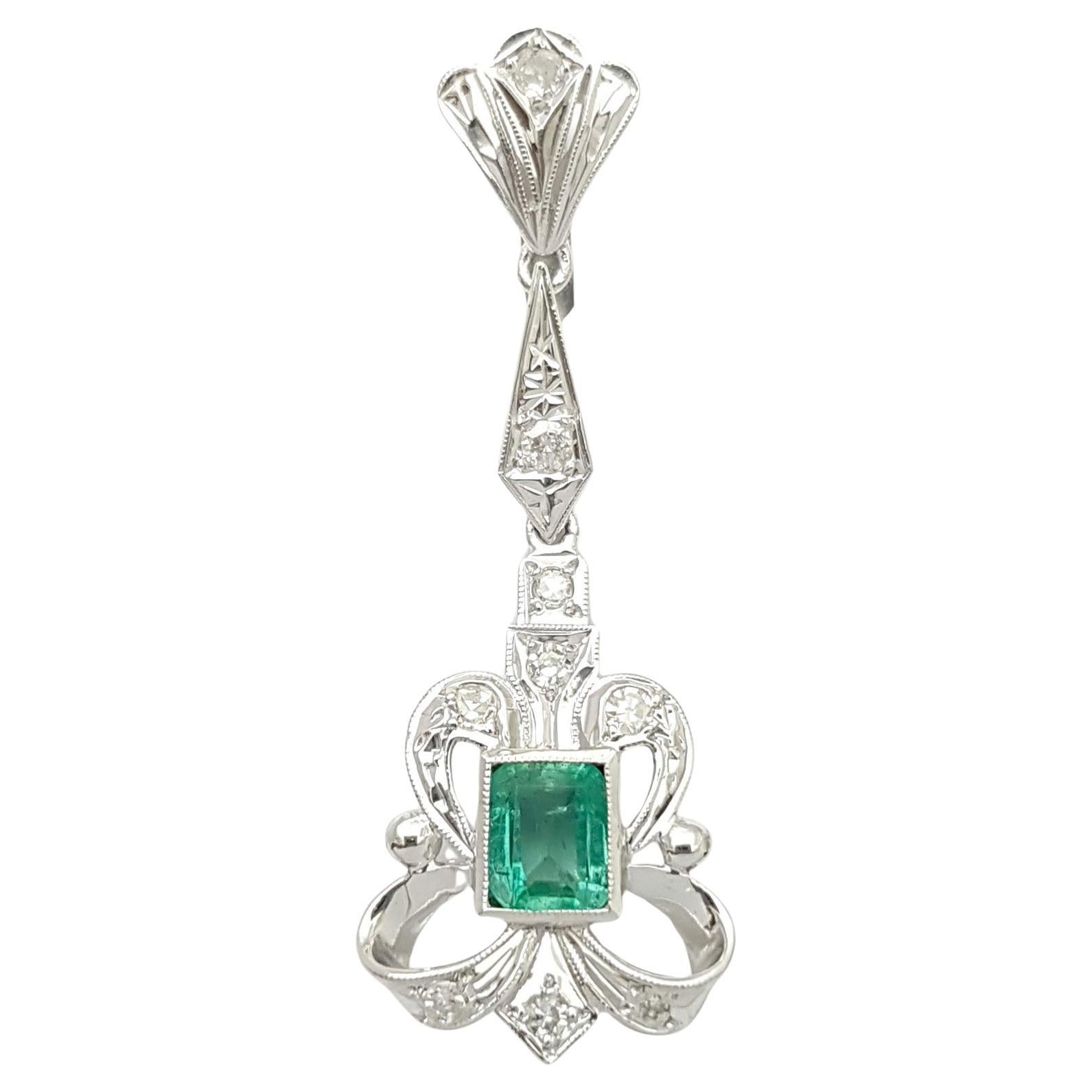 Emerald with Diamond Pendant set in 14K White Gold Setting