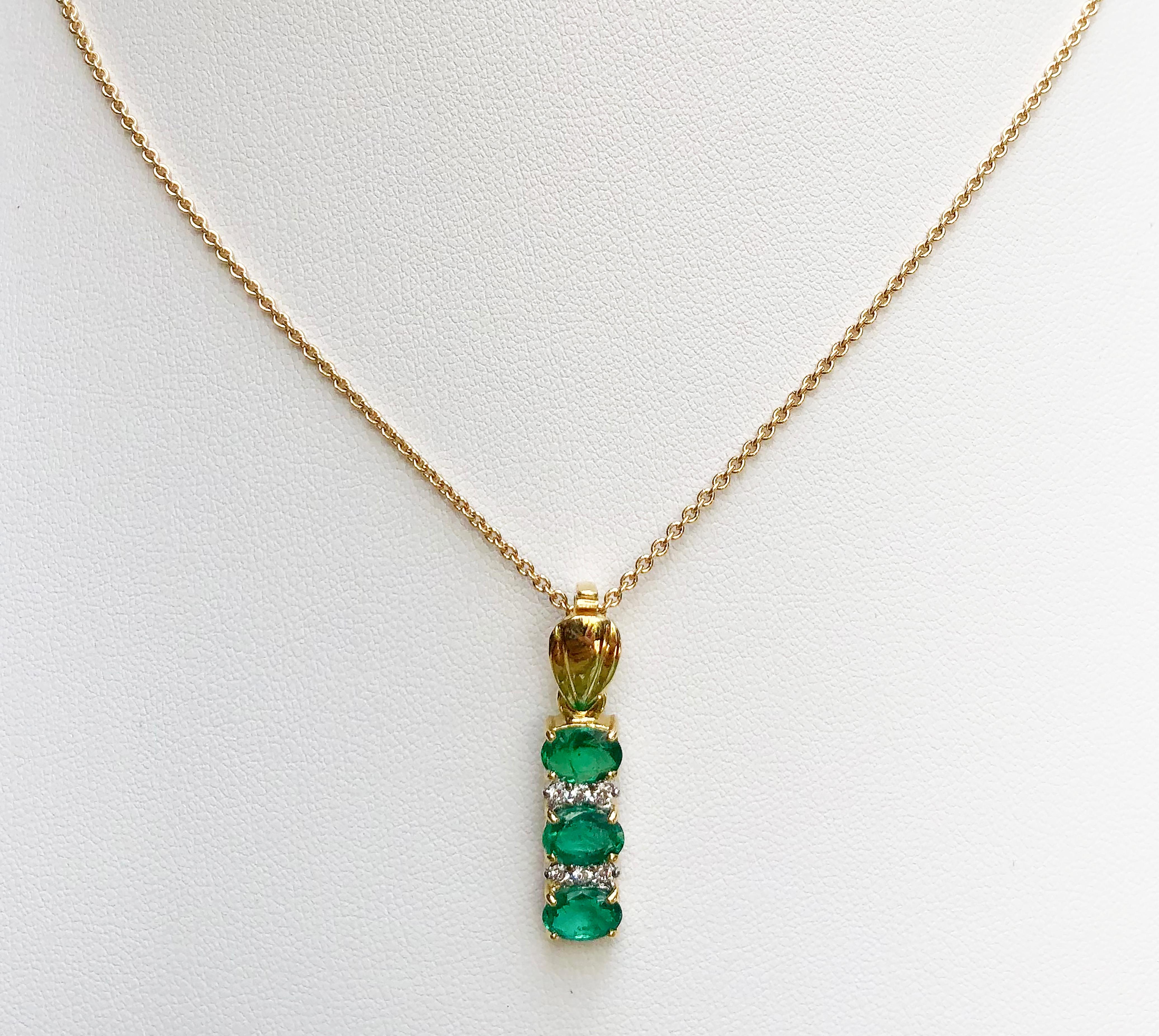 Emerald 1.84 carats with Diamond 0.13 carat Pendant set in 18 Karat Gold Settings
(chain not included)

Width:  0.6 cm 
Length: 3.0 cm
Total Weight: 4.6 grams

