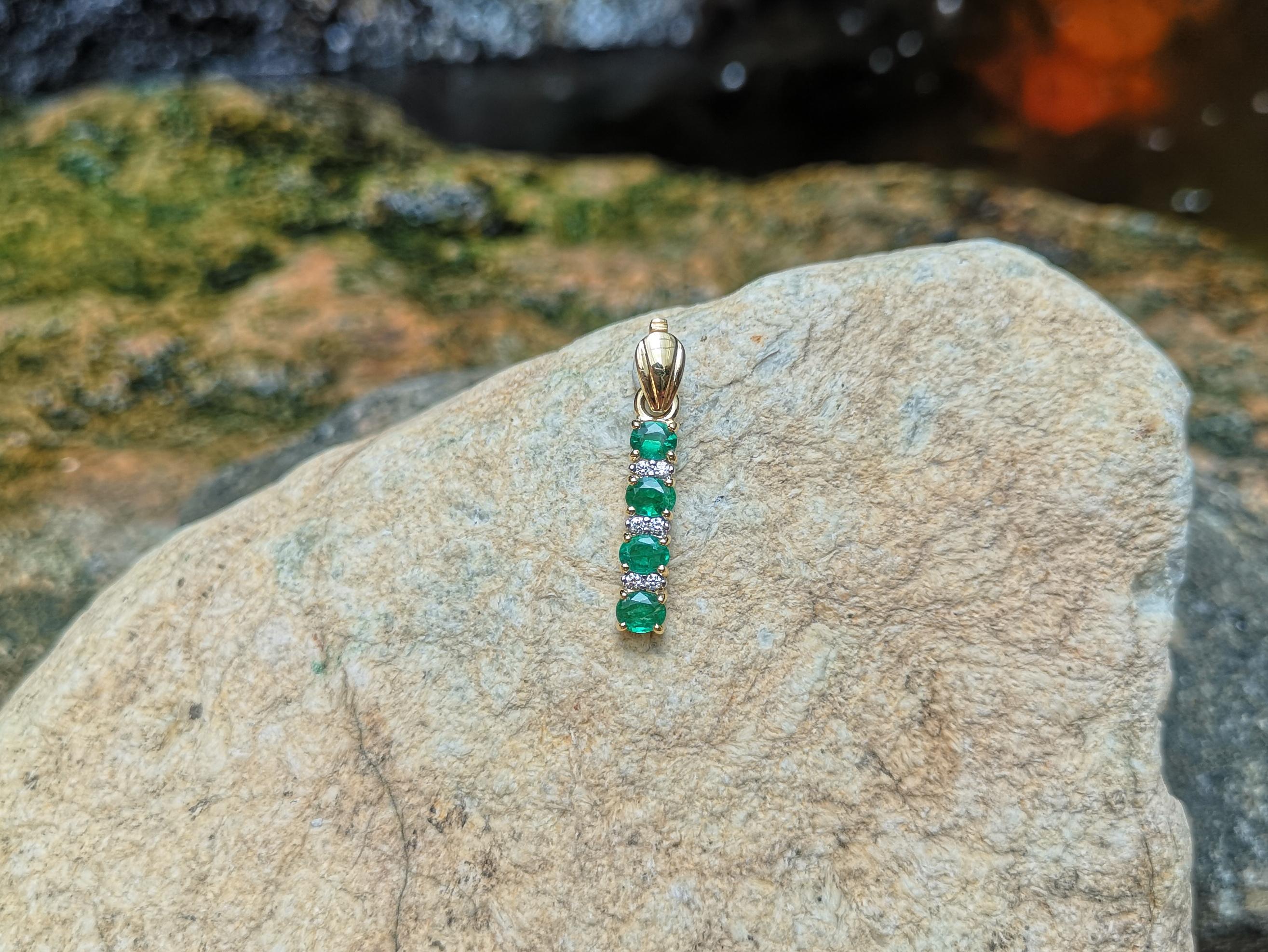 Contemporary Emerald with Diamond Pendant Set in 18 Karat Gold Setting For Sale