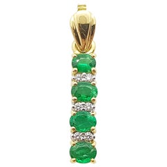 Pendentif en émeraude et diamant serti dans une monture en or 18 carats