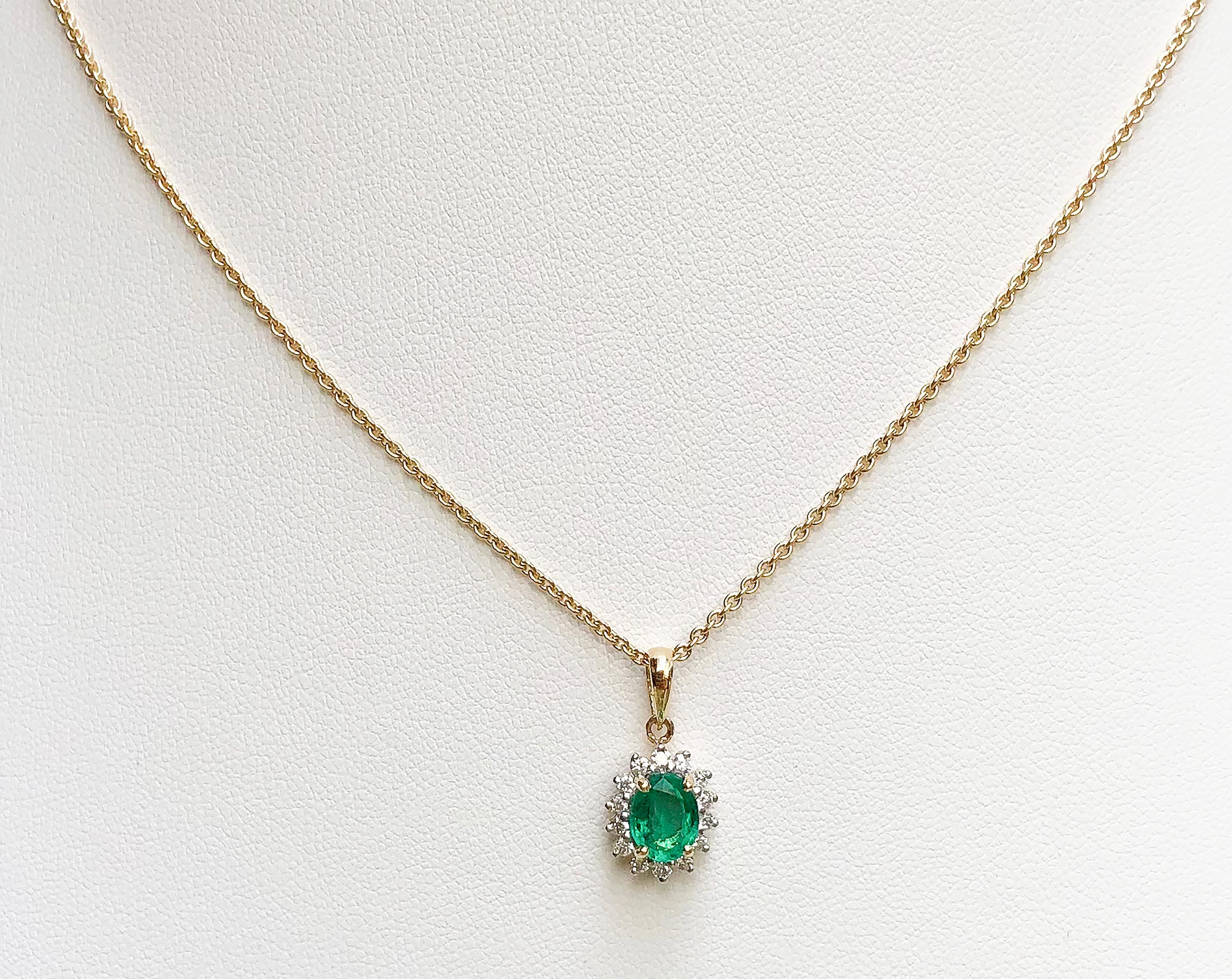 Emerald 0.87 carat with Diamond 0.21 carat Pendant set in 18 Karat Gold Settings
(chain not included)

Width:  0.9 cm 
Length: 1.8 cm
Total Weight: 1.91 grams

