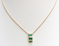 Emerald with Diamond Pendant Set in 18 Karat Gold Settings