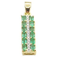Emerald  with Diamond Pendant set in 18 Karat Gold Settings