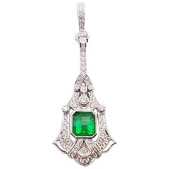 Emerald with Diamond Pendant Set in 18 Karat White Gold Settings