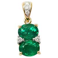 Emerald Carved Pendant Set in Diamond Surround 18K at 1stDibs