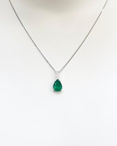 Emerald with Diamond Pendant set in 18K White Gold Settings