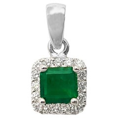 Emerald with Diamond Pendant set in 18K White Gold Settings