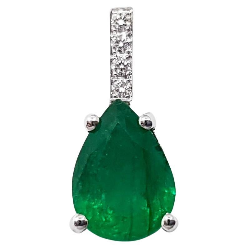 Emerald with Diamond Pendant set in 18K White Gold Settings