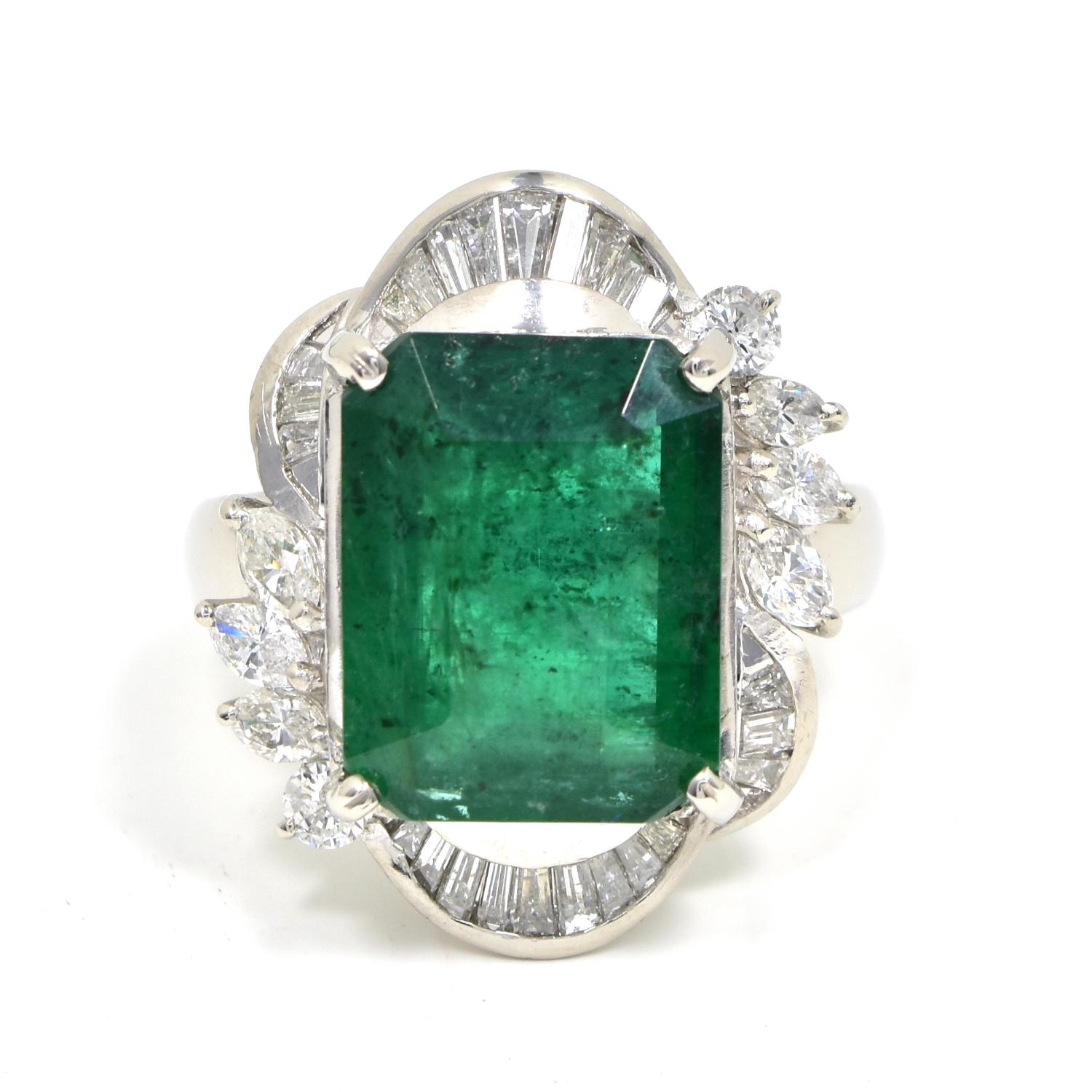 Style: Engagement/Cocktail Ring

Material: Platinum 

Main Stone: Emerald

Main Stone size: Approx. 8 ctw

Additional stones:  Diamonds

Additional stones carats: Approx. 2.5 ctw

Total Item Weight (g): 13.9 grams

​​​Ring Size:  6.5

Includes: 24