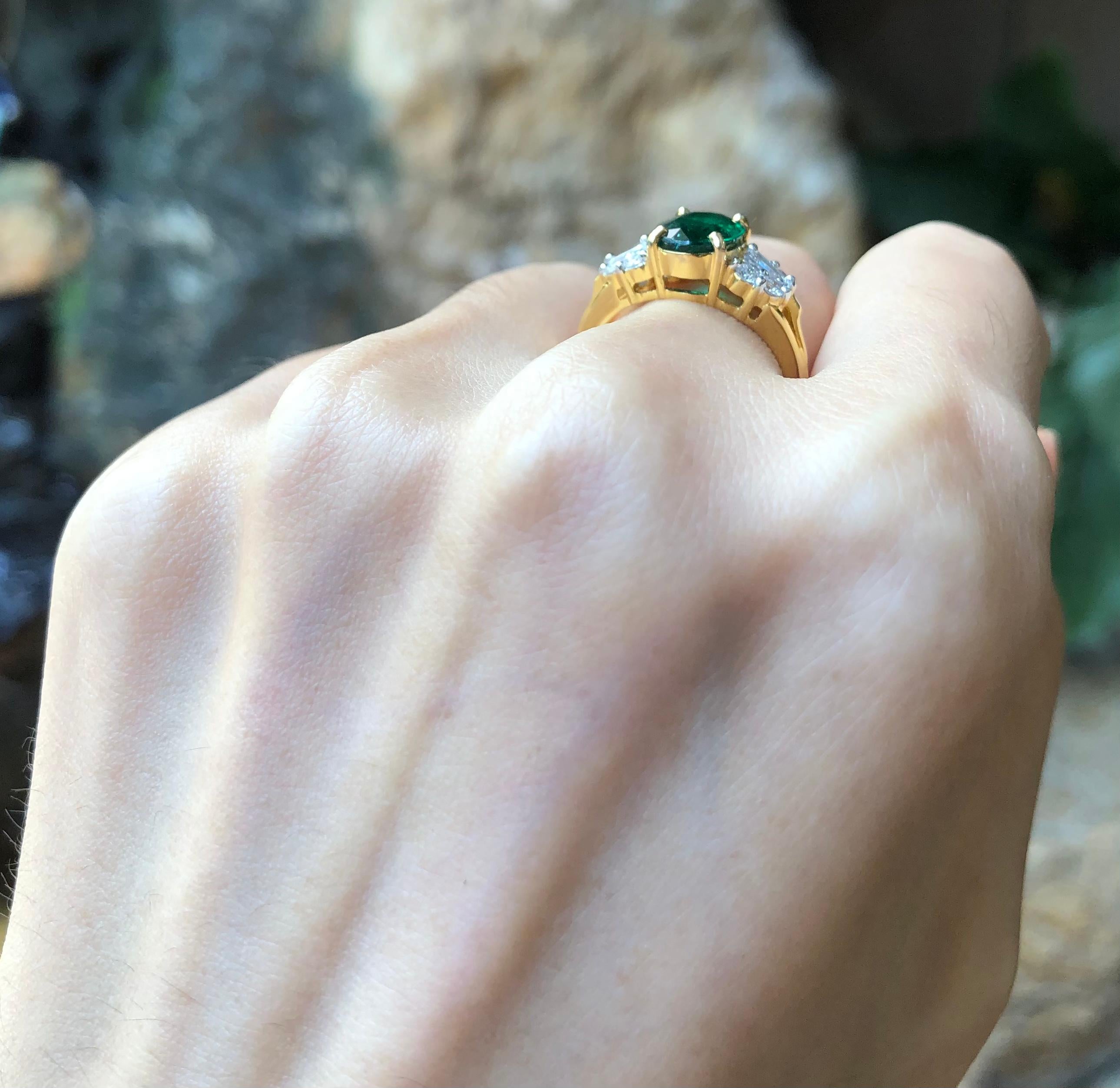 Contemporary Emerald with Diamond Ring set in 18 Karat Gold Settings For Sale