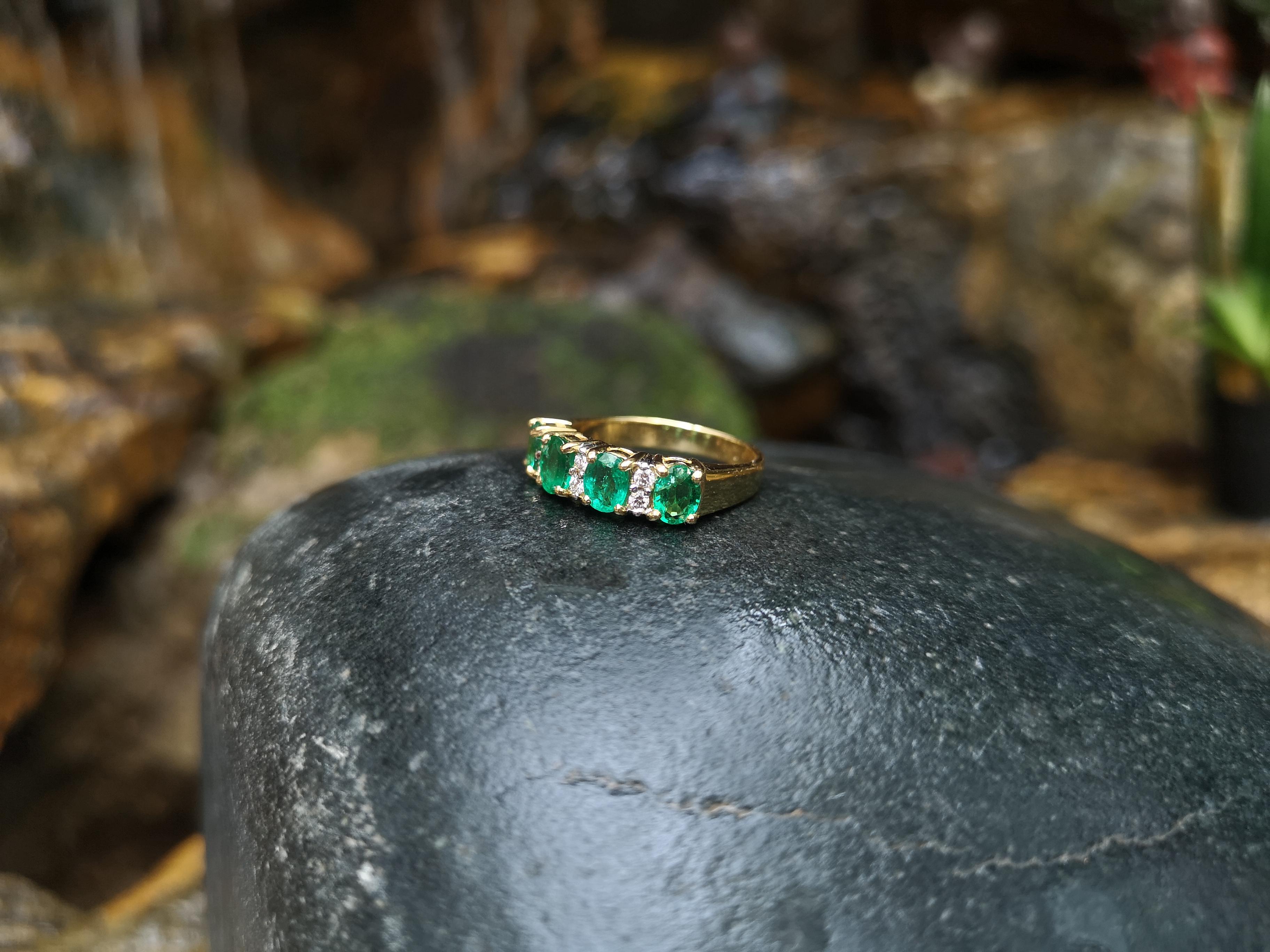 Oval Cut Emerald with Diamond Ring Set in 18 Karat Gold Settings