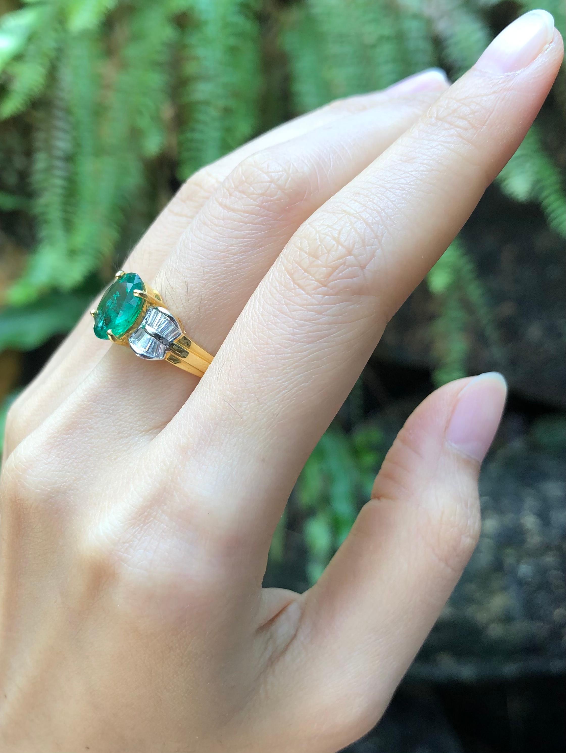 Oval Cut Emerald with Diamond Ring Set in 18 Karat Gold Settings For Sale