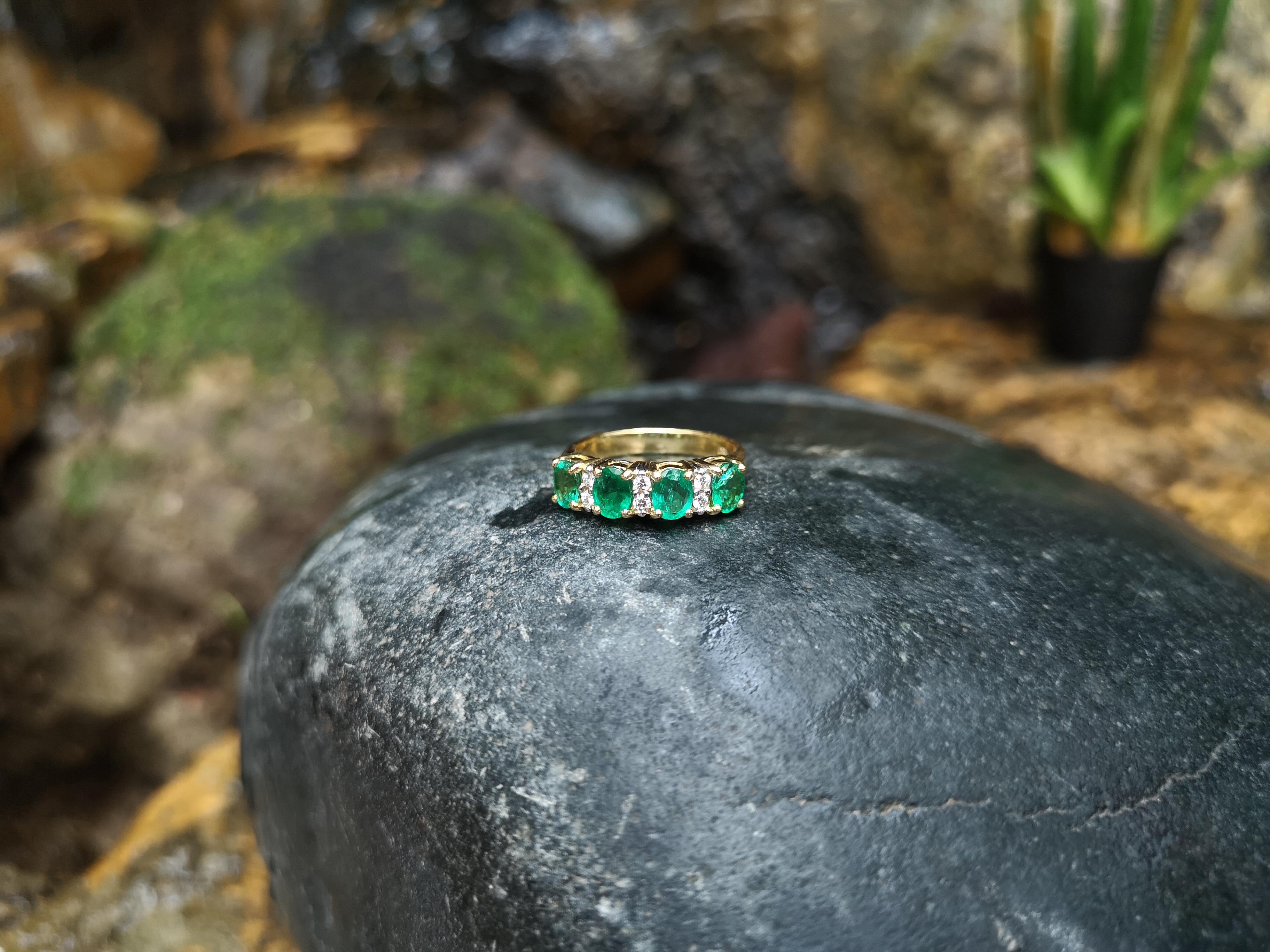 Emerald with Diamond Ring Set in 18 Karat Gold Settings 1