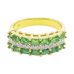 Emerald with Diamond Ring Set in 18 Karat Gold Settings