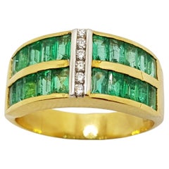 Emerald with Diamond Ring Set in 18 Karat Gold Settings