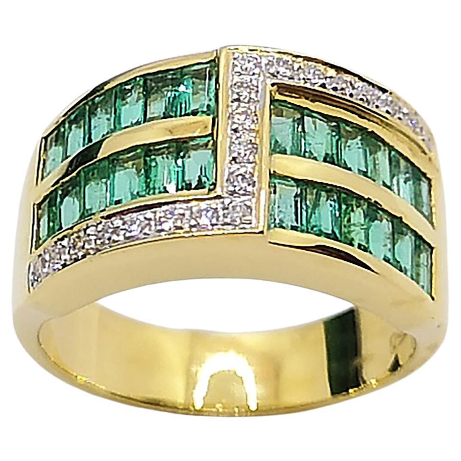 Bague en or 18 carats ornée d'émeraudes et de diamants