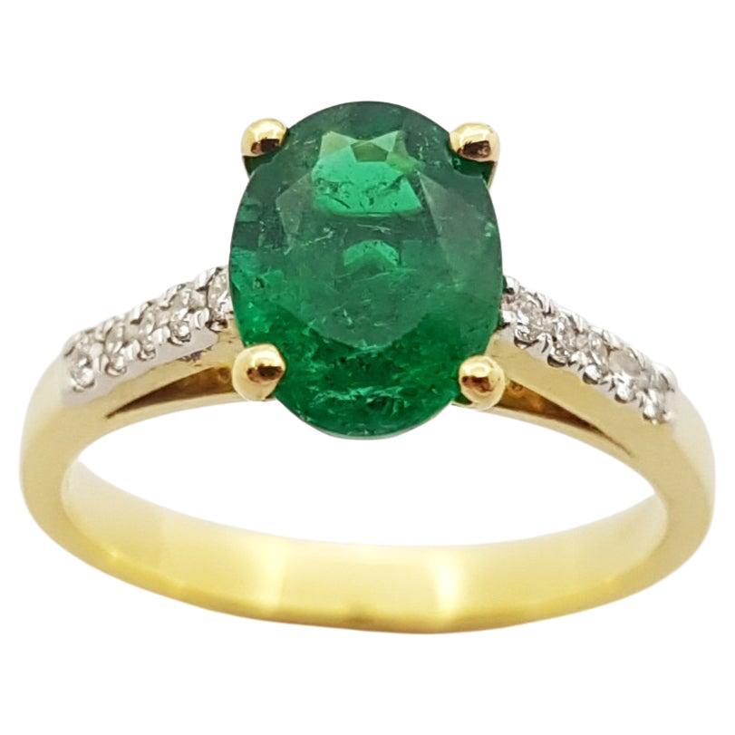 Emerald with Diamond Ring Set in 18 Karat Gold Settings