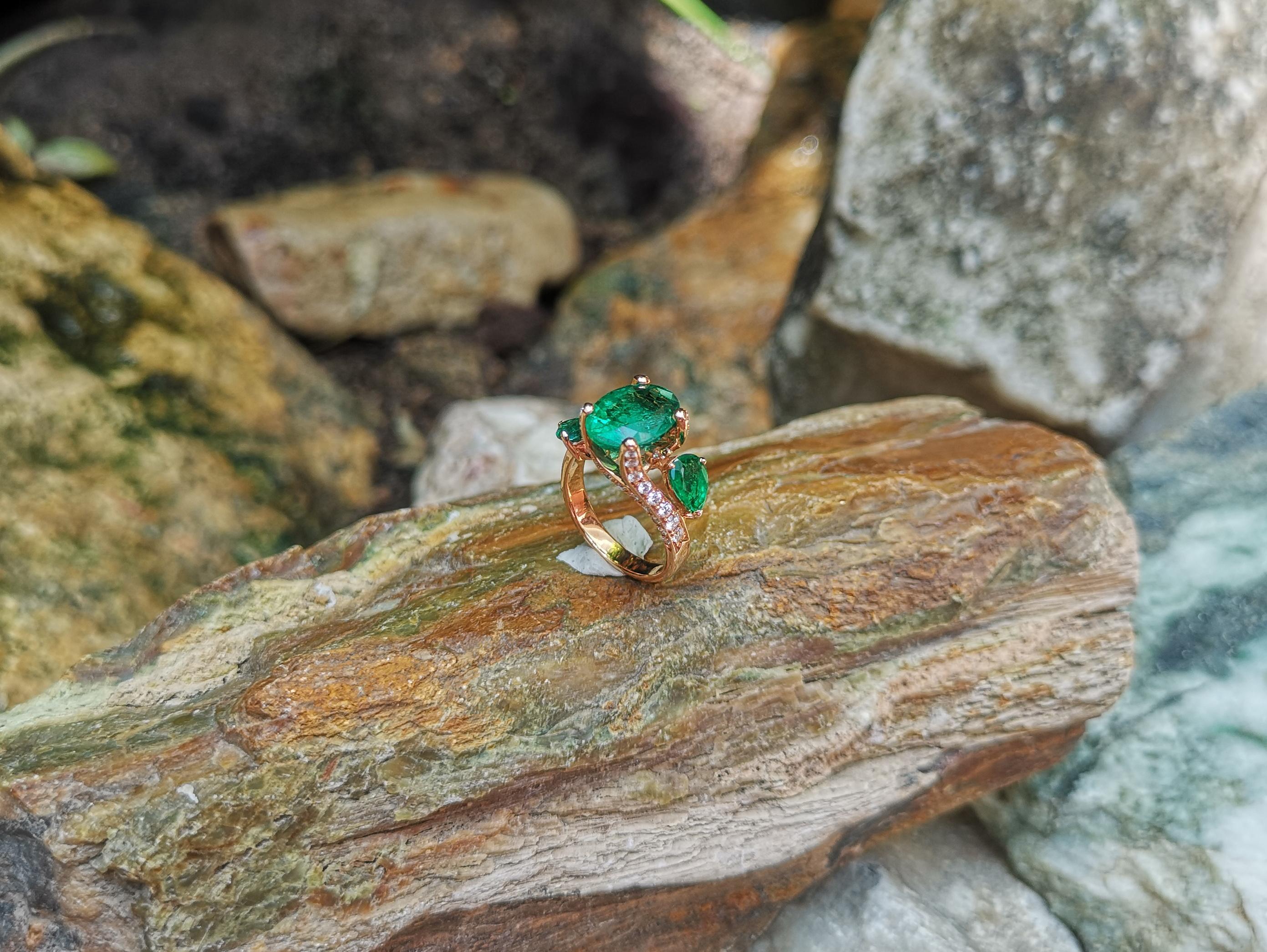 Emerald with Diamond Ring set in 18 Karat Rose Gold Settings For Sale 5