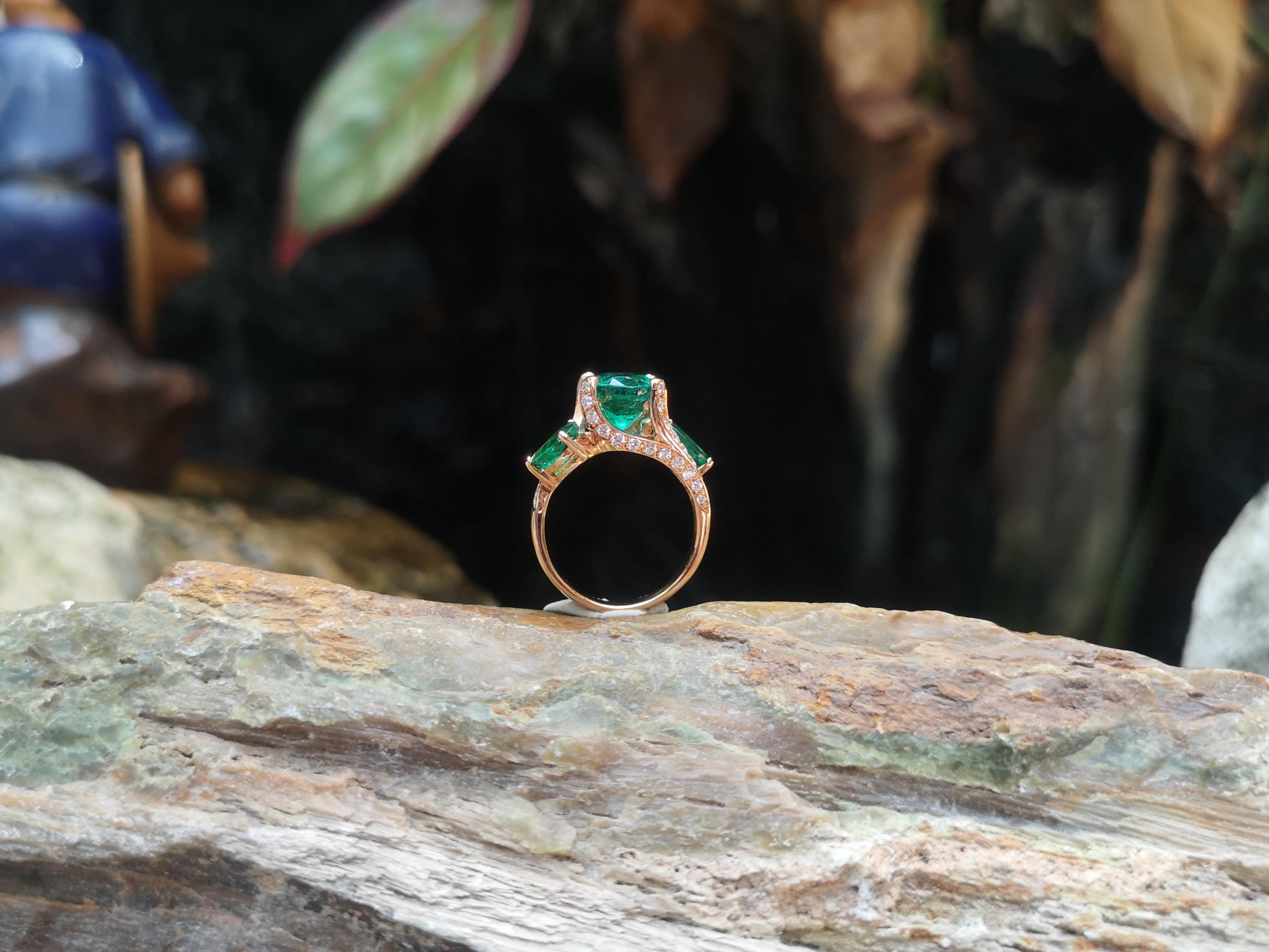 Emerald with Diamond Ring set in 18 Karat Rose Gold Settings For Sale 9