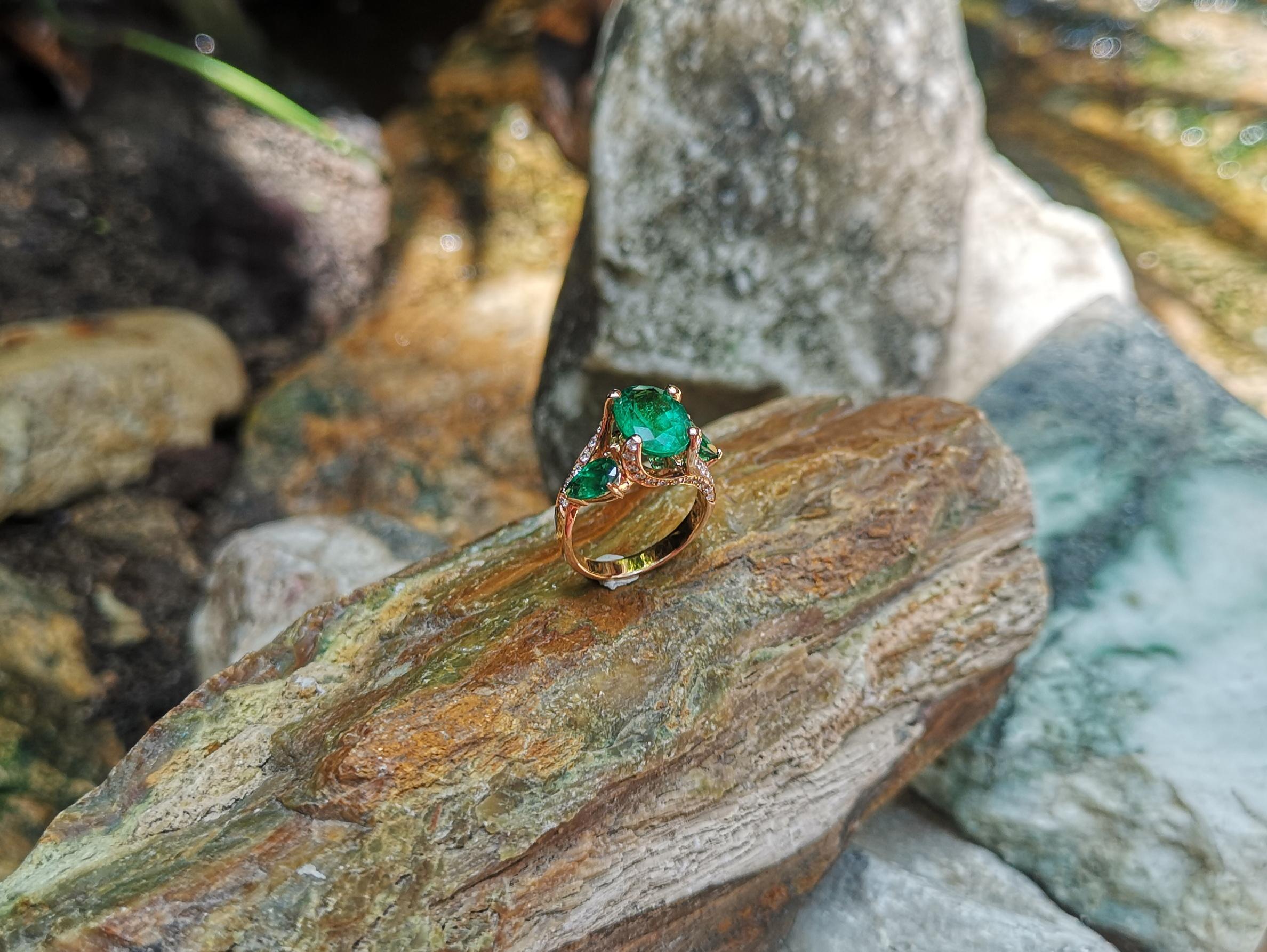 Emerald with Diamond Ring set in 18 Karat Rose Gold Settings For Sale 11