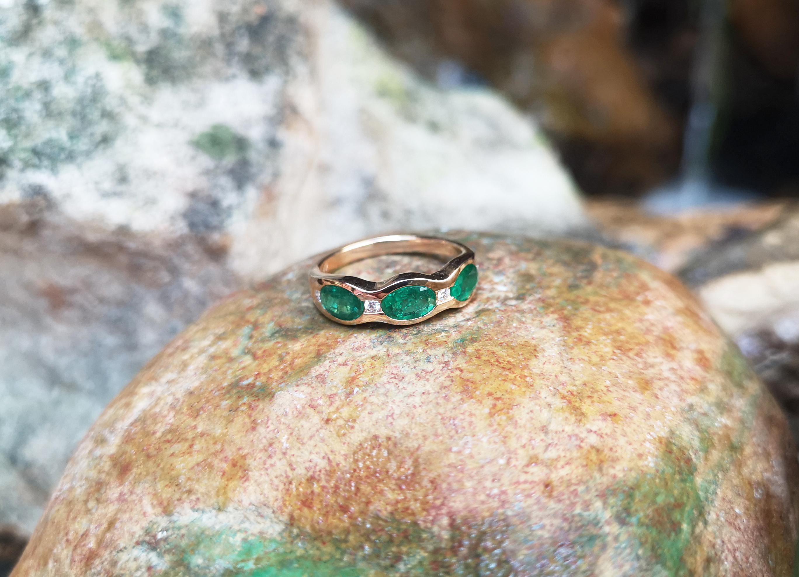 Oval Cut Emerald with Diamond Ring Set in 18 Karat Rose Gold Settings For Sale