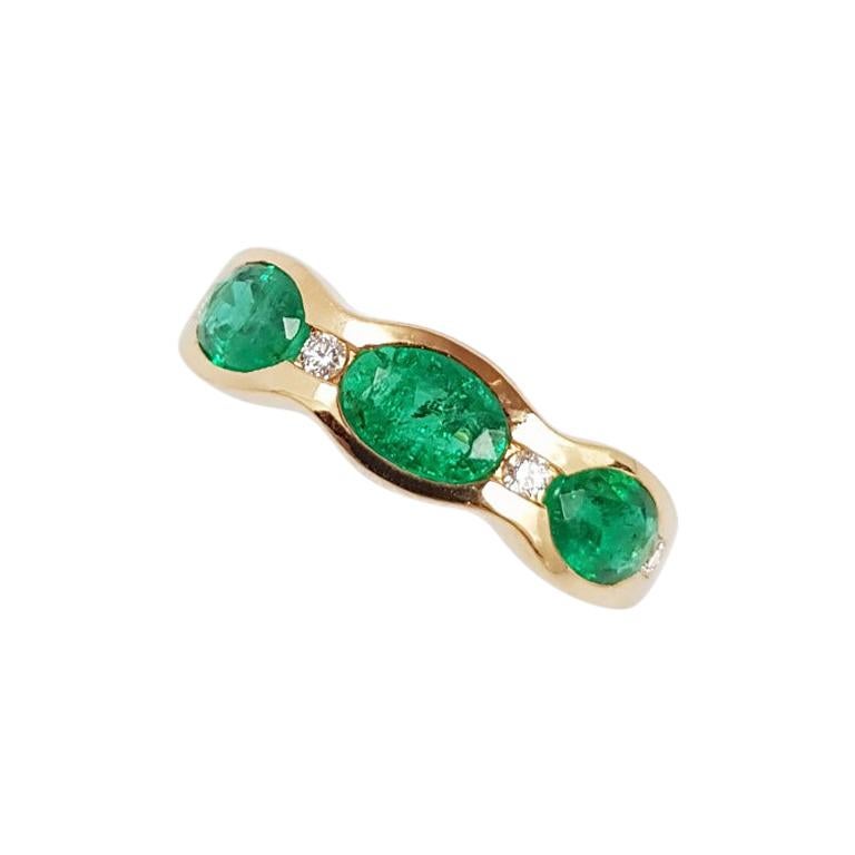 Emerald with Diamond Ring Set in 18 Karat Rose Gold Settings For Sale