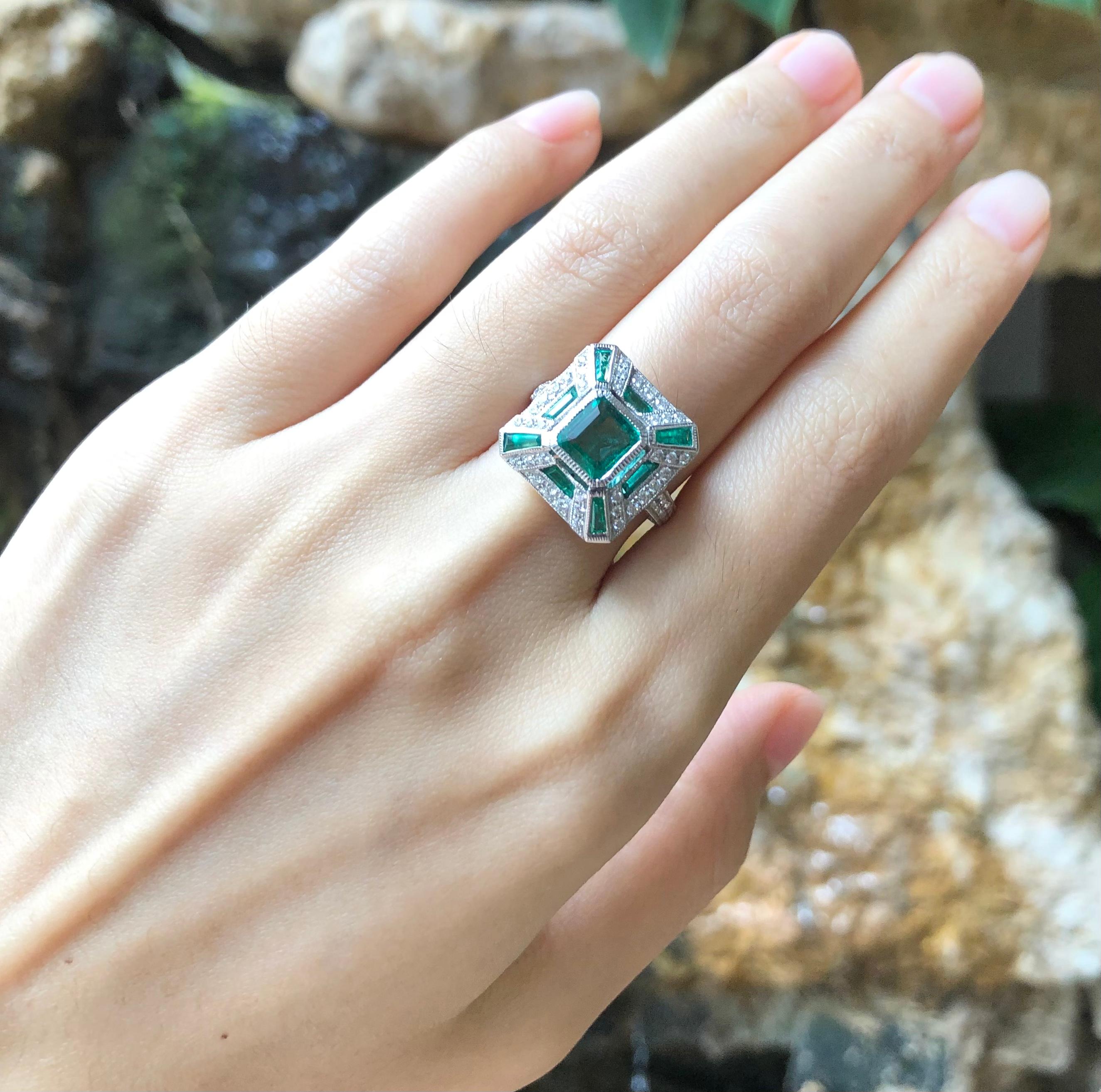 Emerald with Diamond Ring Set in 18 Karat White Gold Settings 6