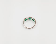 Emerald with Diamond Ring Set in 18 Karat White Gold Settings