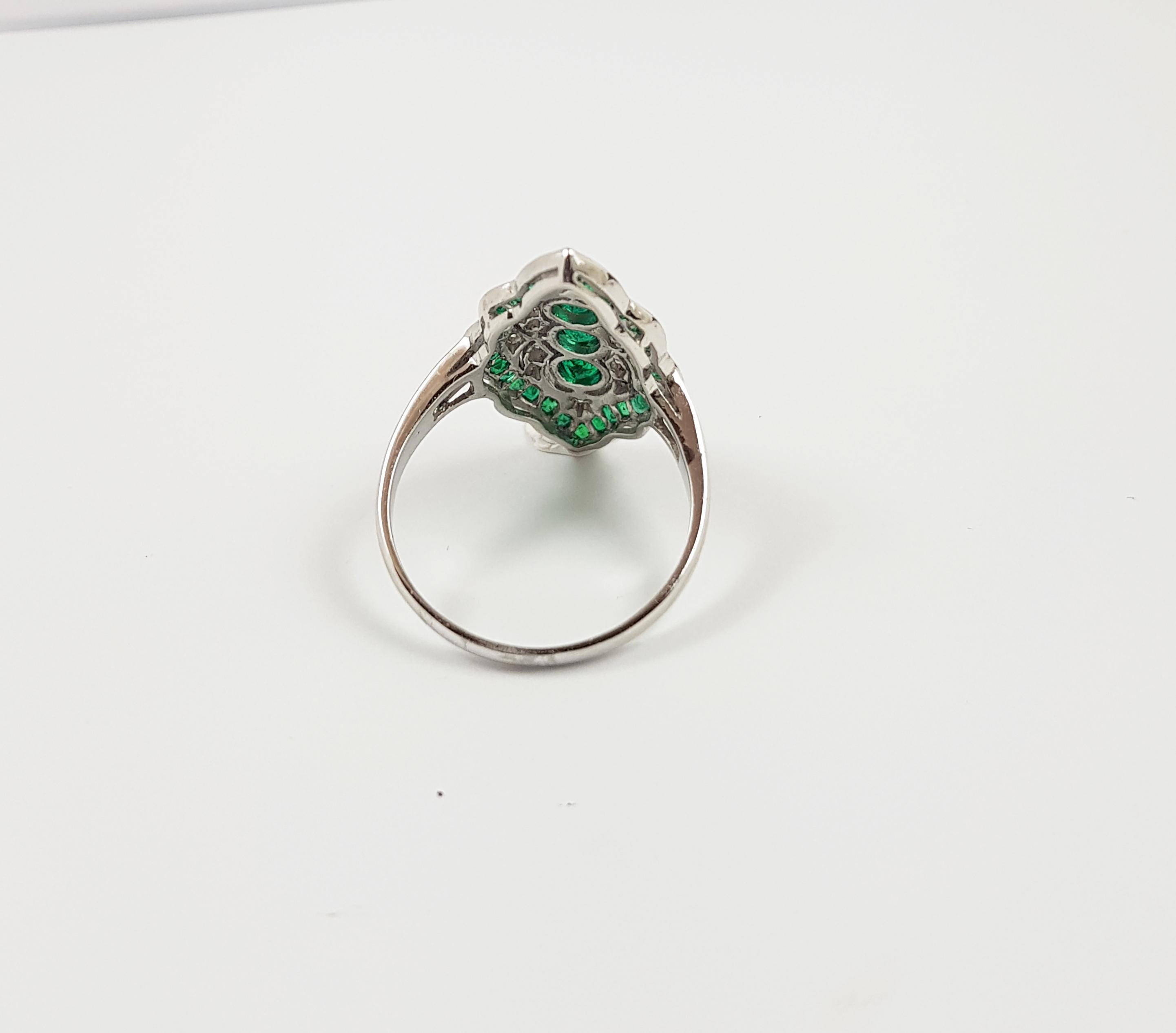 Emerald 1.50 carats with Diamond 0.18 carat Ring set in 18 Karat White Gold Settings

Width: 1.3 cm
Length: 2.3 cm 
Ring Size: 55

