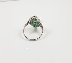 Emerald with Diamond Ring Set in 18 Karat White Gold Settings
