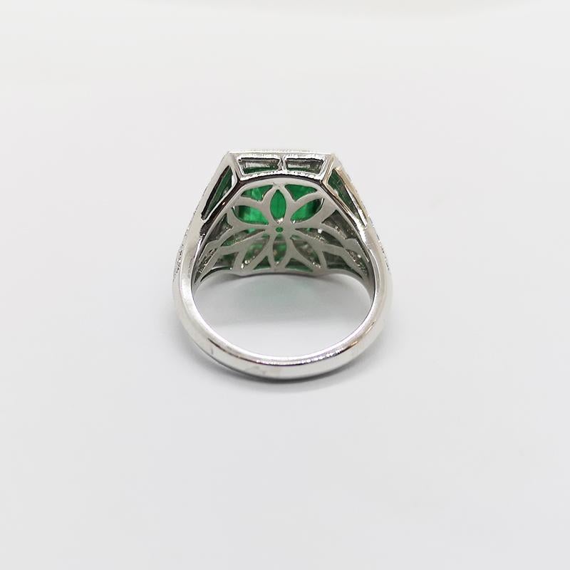 Emerald 3.30 carats with Diamond 0.78 carat  Ring set in 18 Karat White Gold Settings

Width: 1.7 cm
Length: 1.5 cm 
Ring Size: 51

