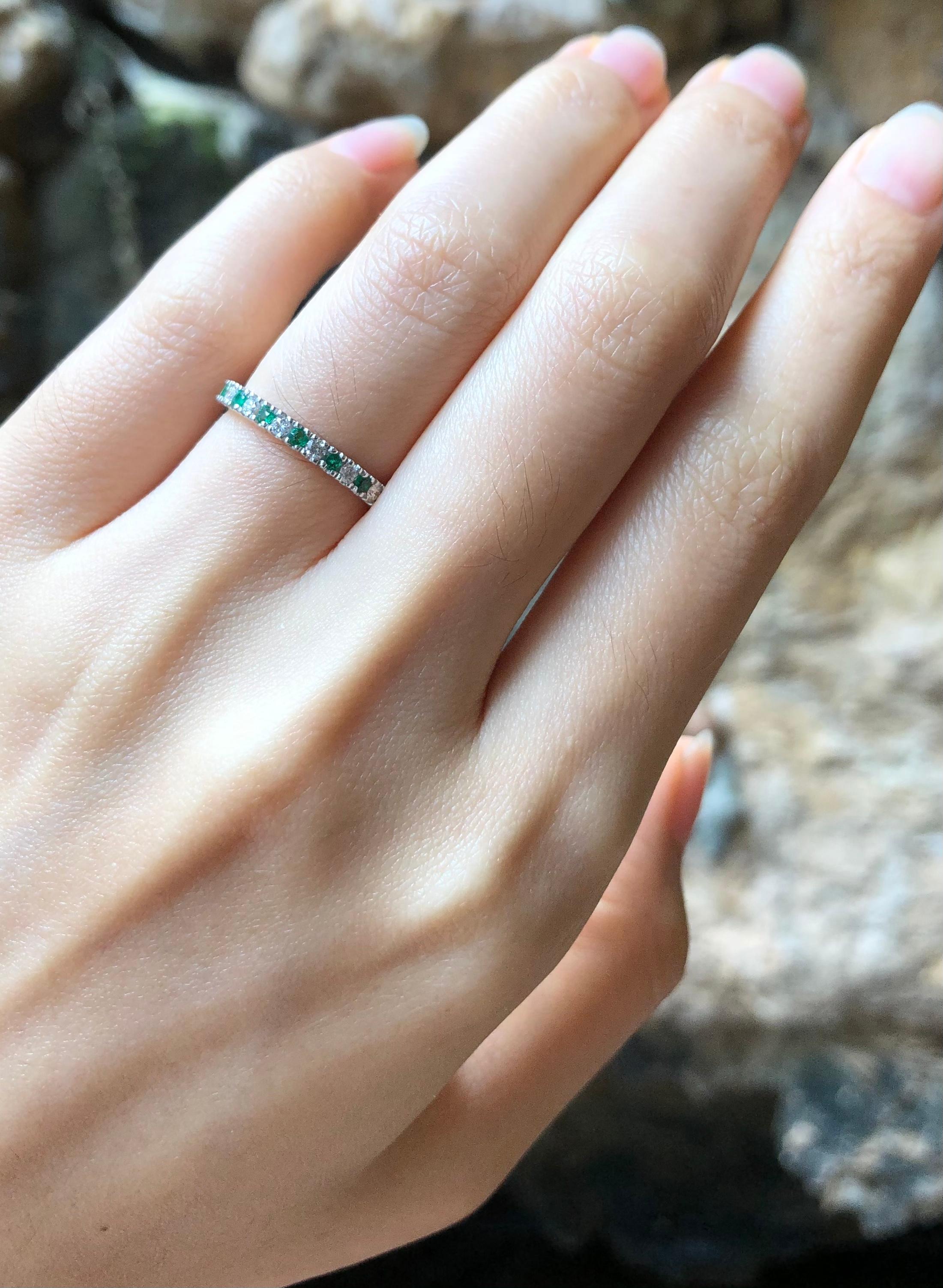Emerald 0.15 carat with Diamond 0.16  carat Ring set in 18 Karat White Gold Settings

Width:  3.0 cm 
Length: 0.2 cm
Ring Size: 48
Total Weight: 1.97 grams

