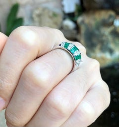 Emerald with Diamond Ring Set in 18 Karat White Gold Settings