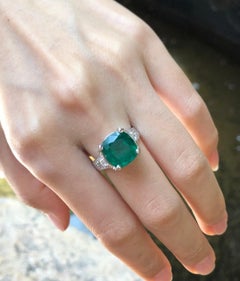 Emerald with Diamond Ring Set in 18 Karat White Gold Settings