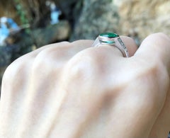 Emerald with Diamond Ring Set in 18 Karat White Gold Settings
