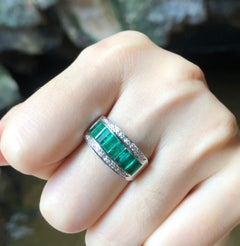Emerald with Diamond Ring Set in 18 Karat White Gold Settings