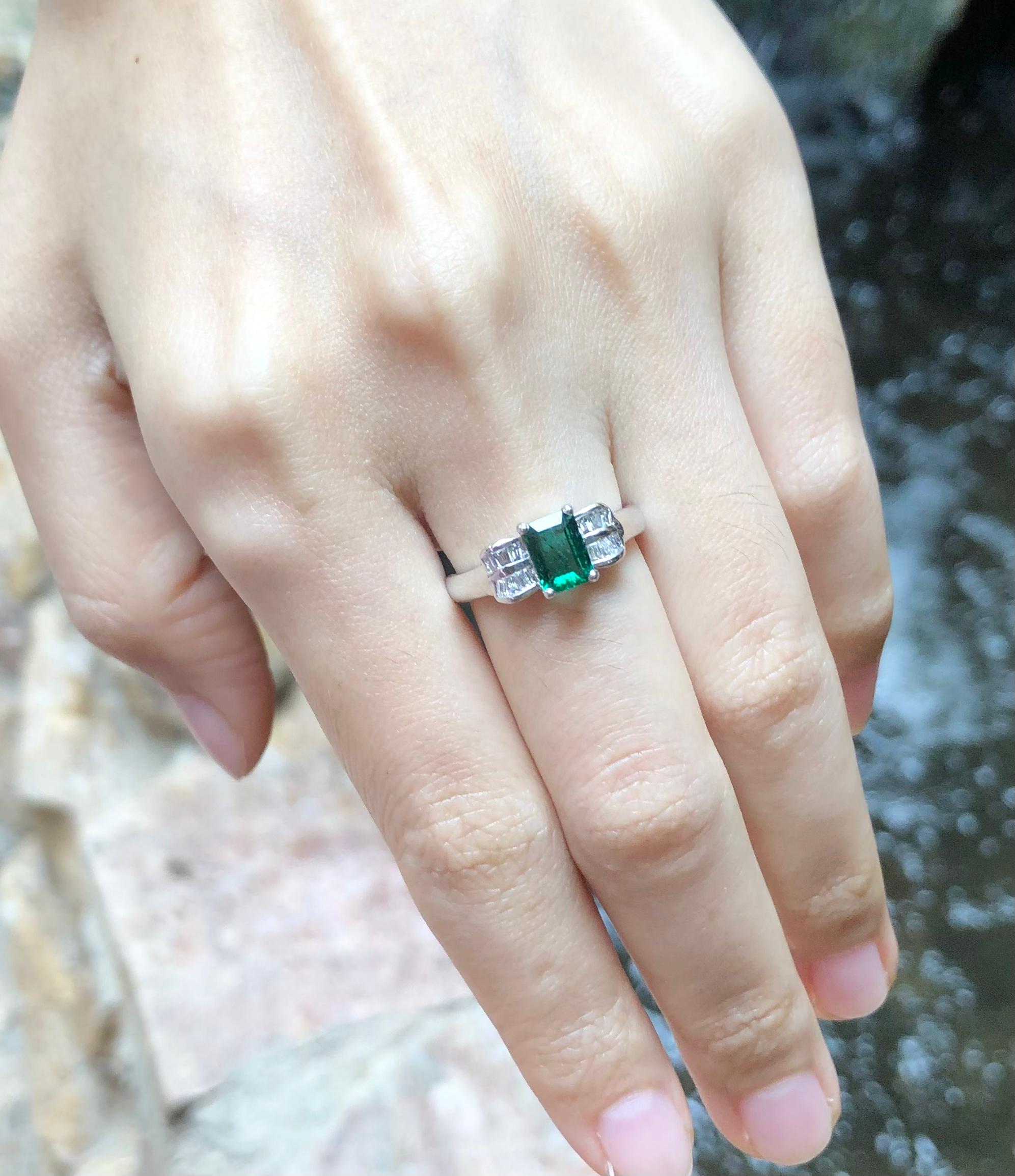 Emerald 0.77 carat with Diamond 0.21 carat Ring set in 18 Karat White Gold Settings

Width:  1.2 cm 
Length: 0.7 cm
Ring Size: 52
Total Weight: 4.18 grams

Emerald
Width:  0.5 cm 
Length: 0.7 cm

