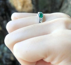 Emerald with Diamond Ring Set in 18 Karat White Gold Settings