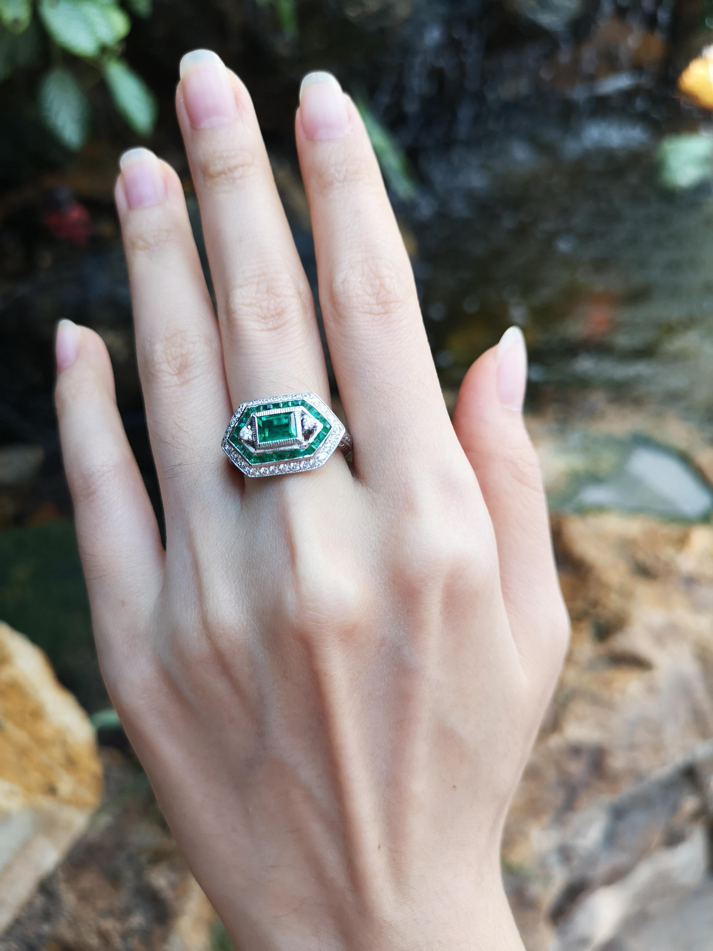 Emerald 0.68 carat, Emerald 0.87 carat with Diamond 0.38 carat Ring set in 18 Karat White Gold Settings  

Width: 1.9 cm
Length: 1.1 cm 
Ring Size: 53

