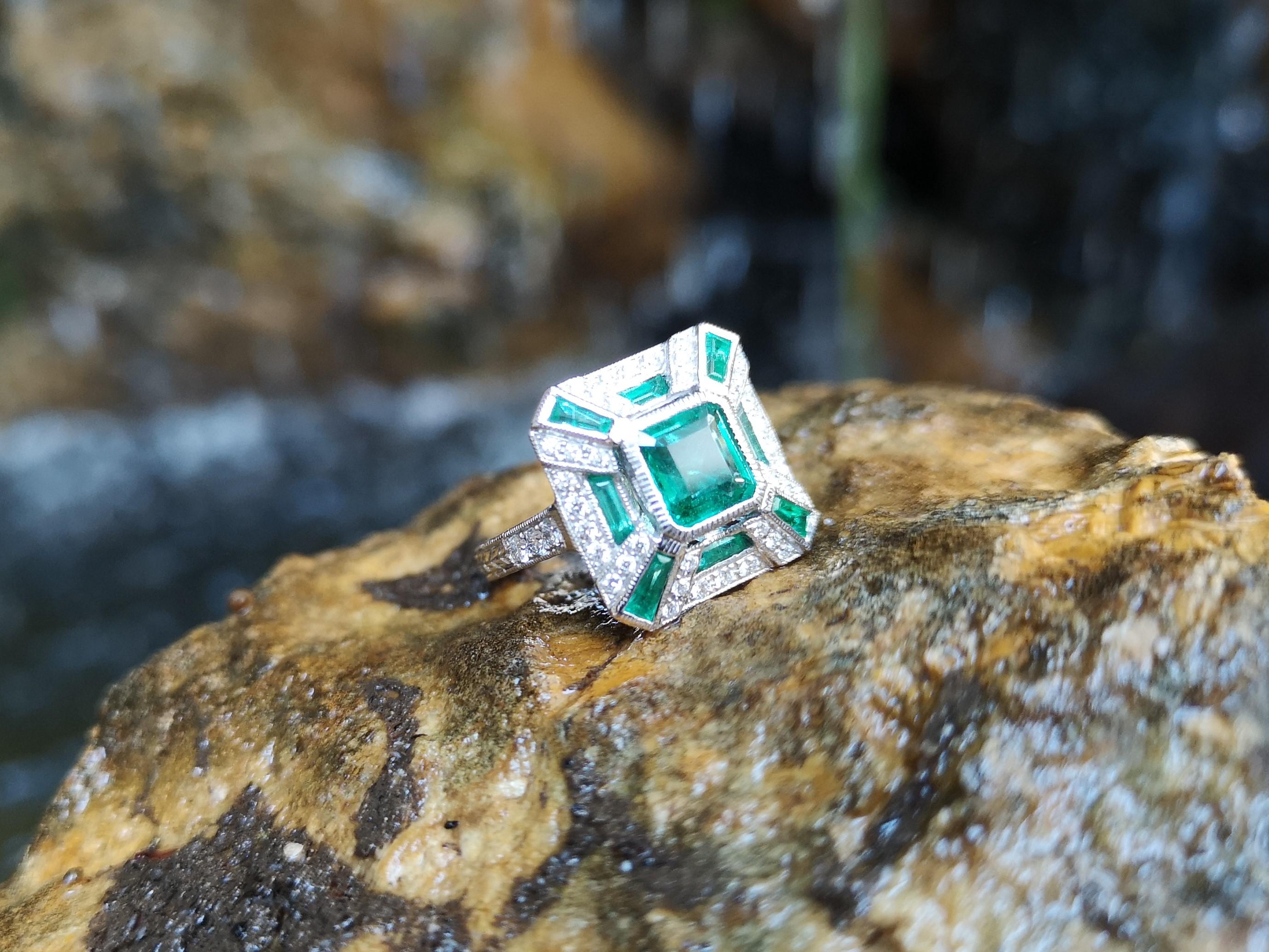Women's Emerald with Diamond Ring Set in 18 Karat White Gold Settings