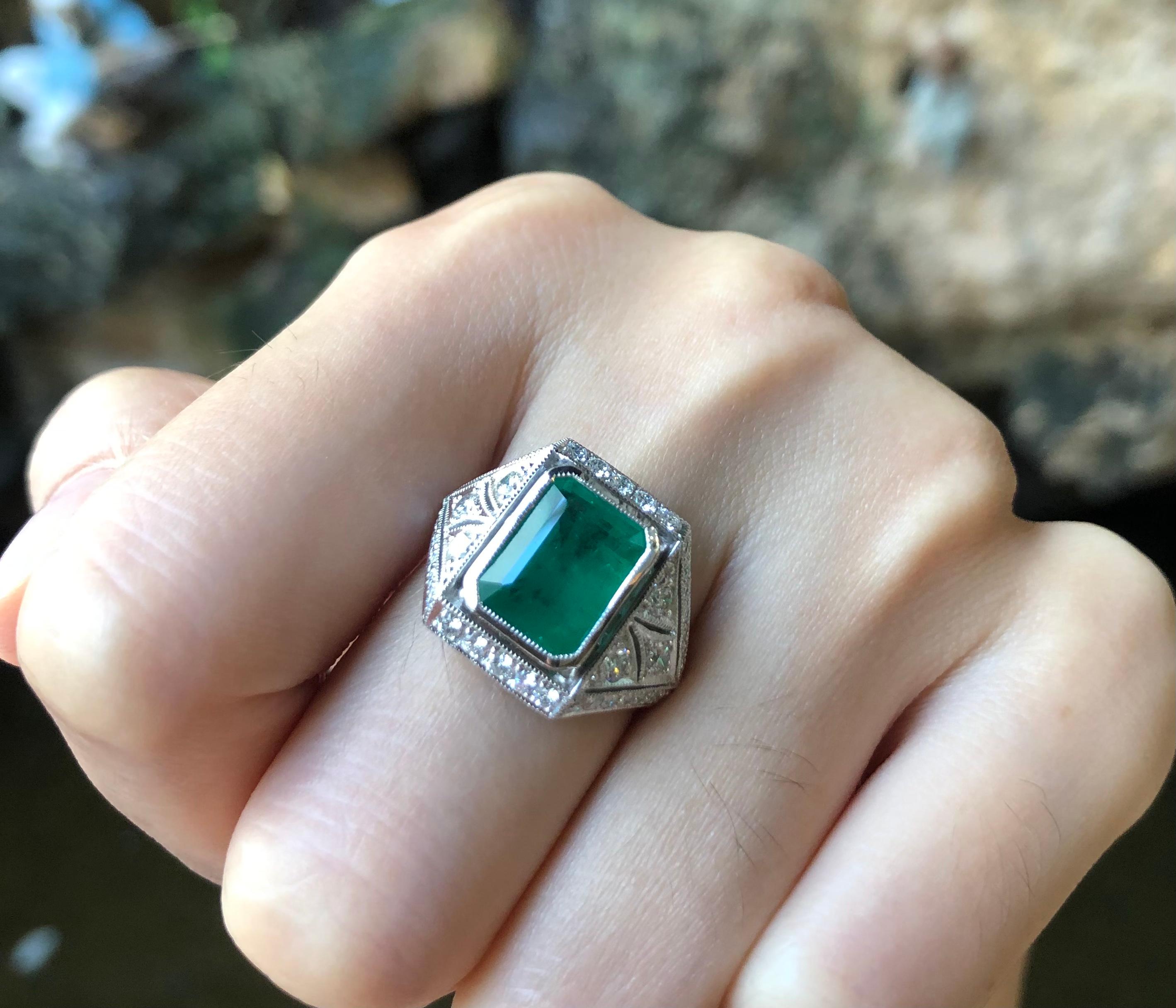 Women's Emerald with Diamond Ring Set in 18 Karat White Gold Settings For Sale