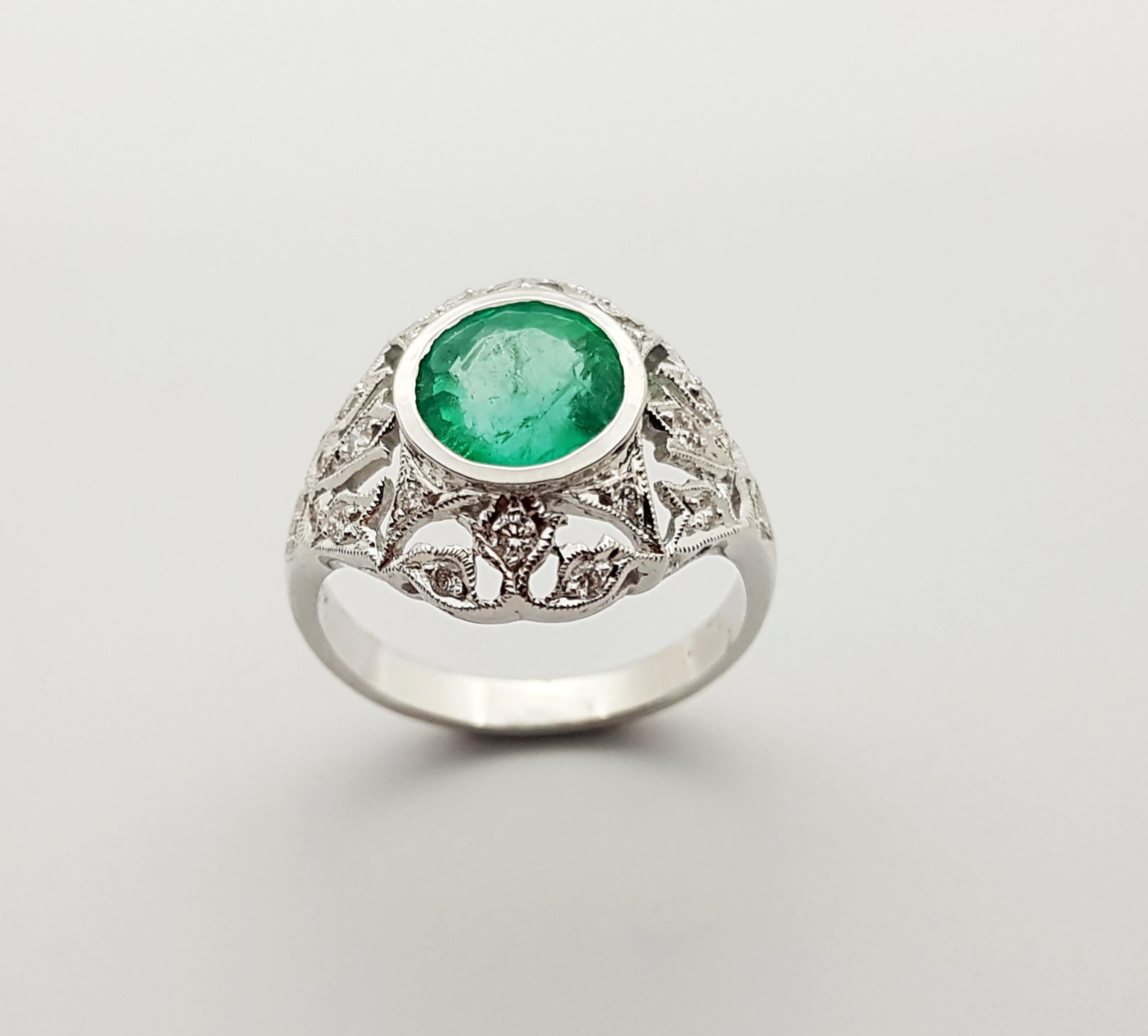 Women's Emerald with Diamond Ring Set in 18 Karat White Gold Settings For Sale