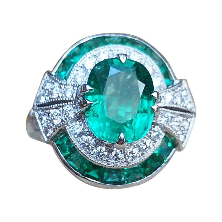Emerald with Diamond Ring Set in 18 Karat White Gold Settings For Sale