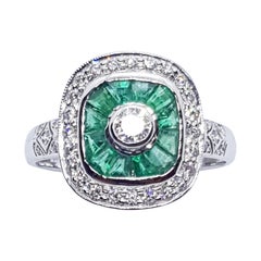 Ring mit Smaragd und Diamant in 18 Karat Weißgoldfassung