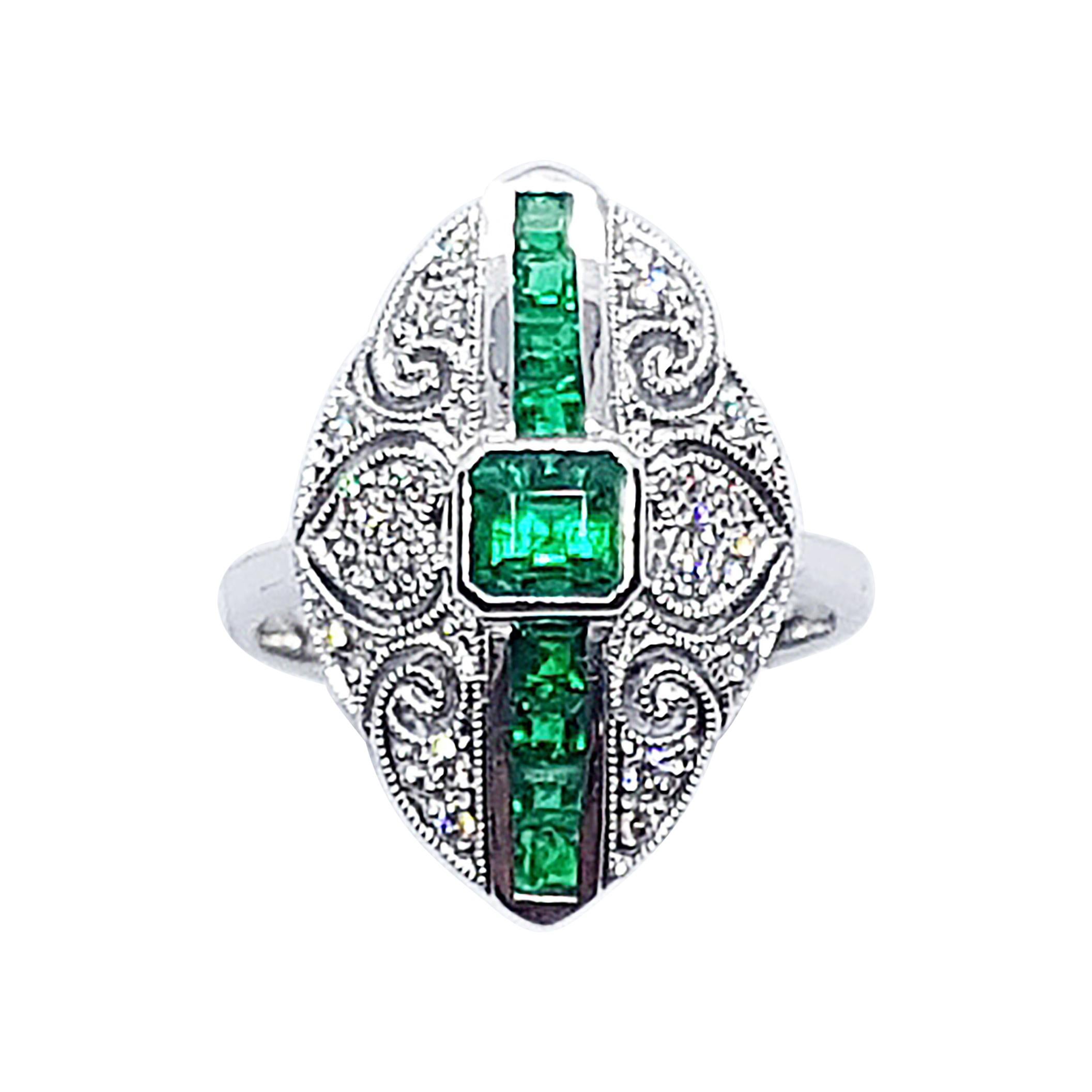 Emerald with Diamond Ring Set in 18 Karat White Gold Settings