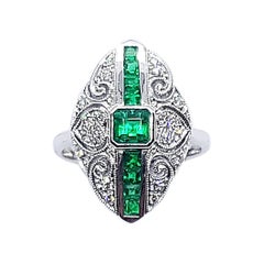 Bague en or blanc 18 carats sertie d'émeraudes et de diamants