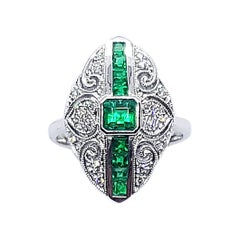 Emerald with Diamond Ring Set in 18 Karat White Gold Settings