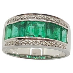 Emerald with Diamond Ring Set in 18 Karat White Gold Settings